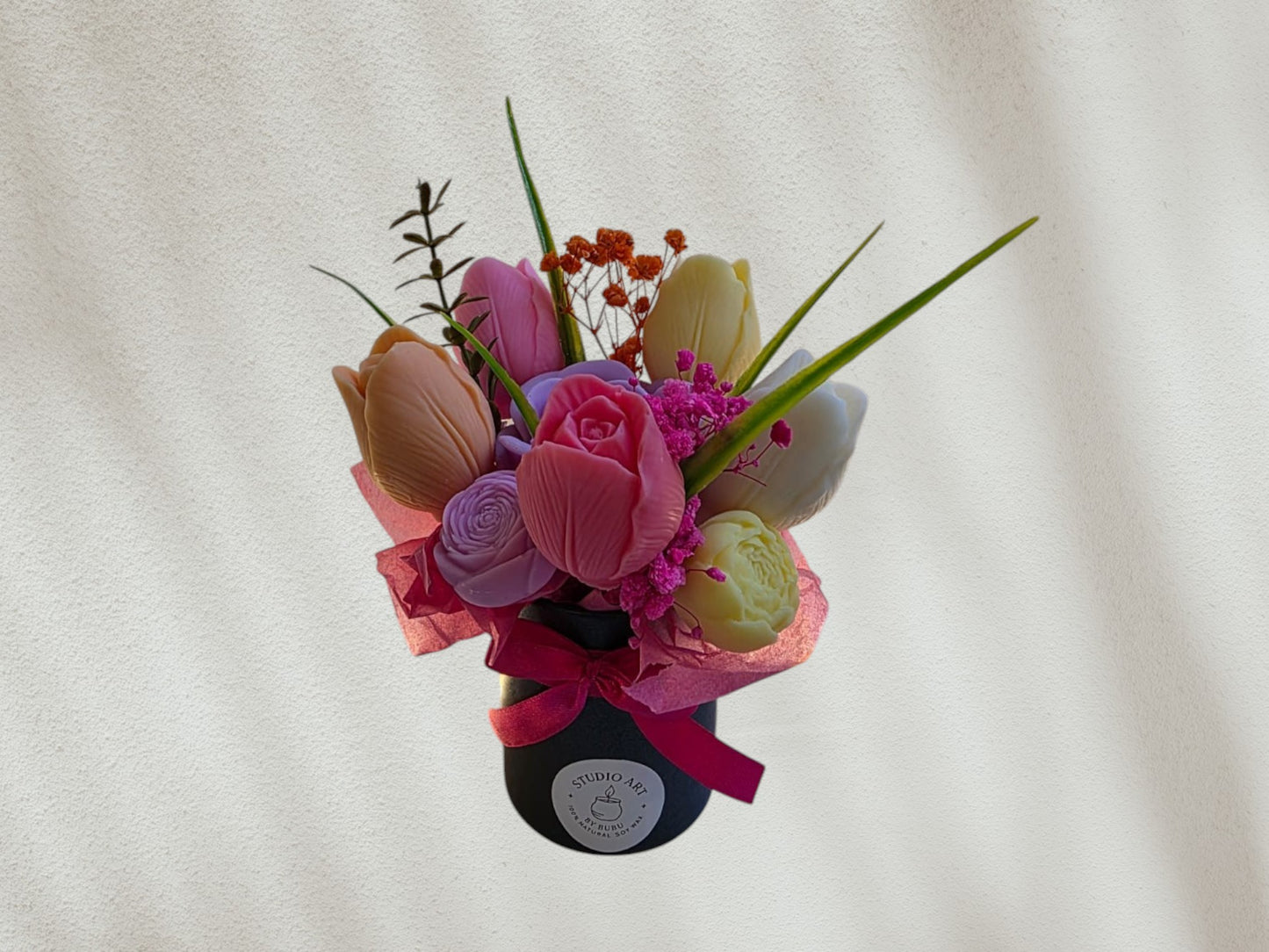 Small scented candle flower arrangement