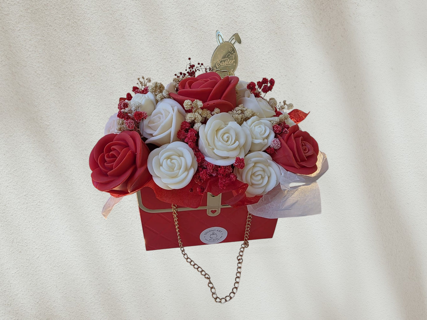 Scented flower arrangement in a black bag shape