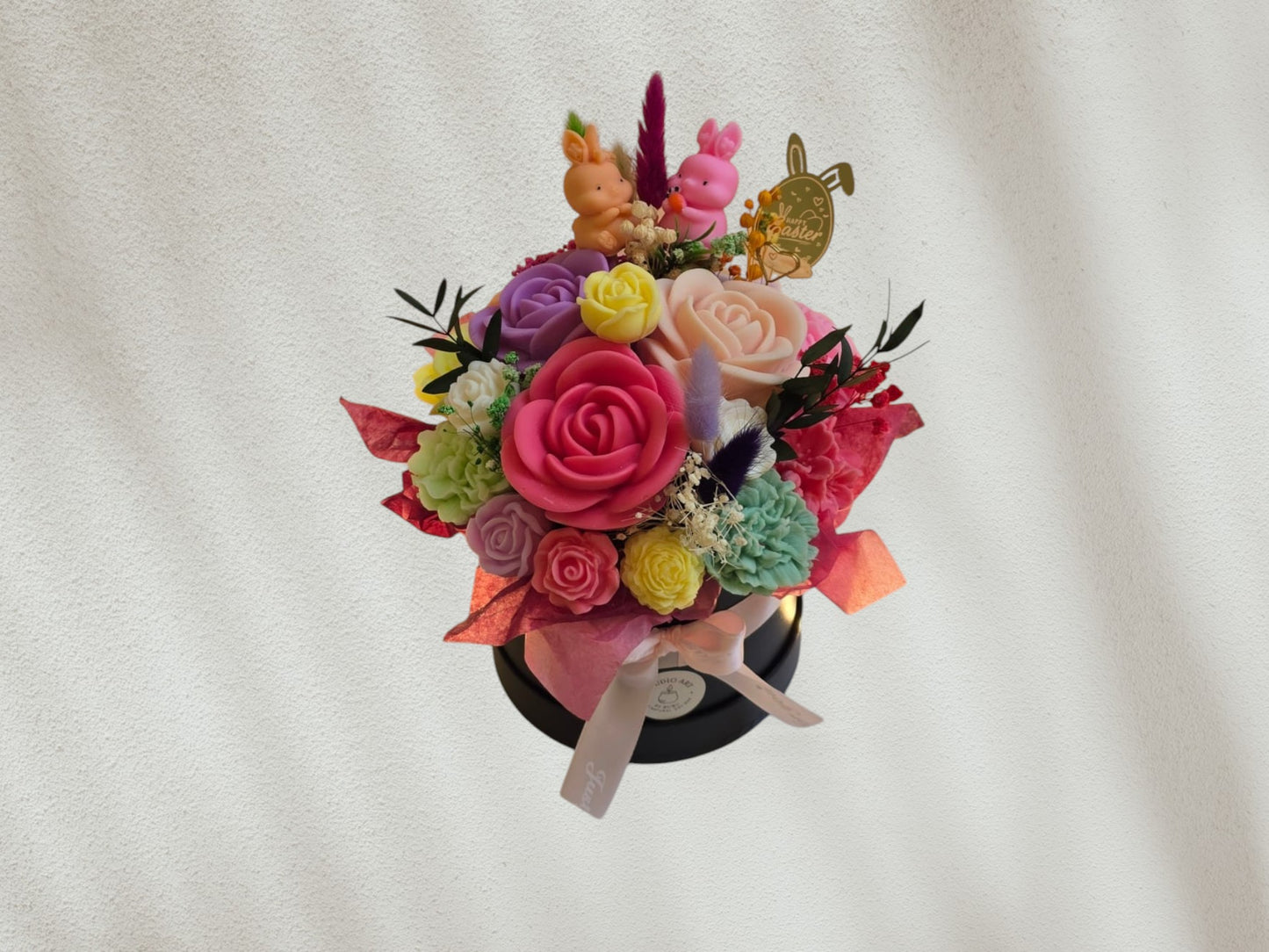 Easter scented candle flower arrangement in a medium black box