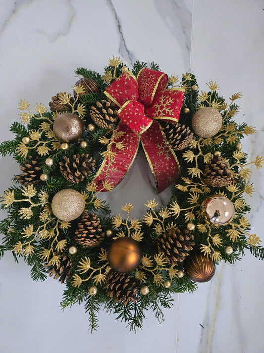 Natural Christmas wreath decoration in gold