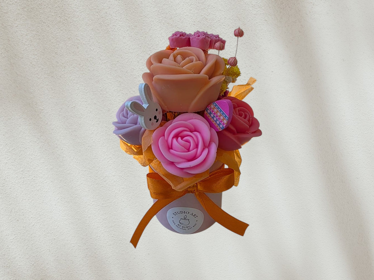 Pink flower arrangement in a box