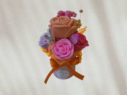 Pink flower arrangement in a box