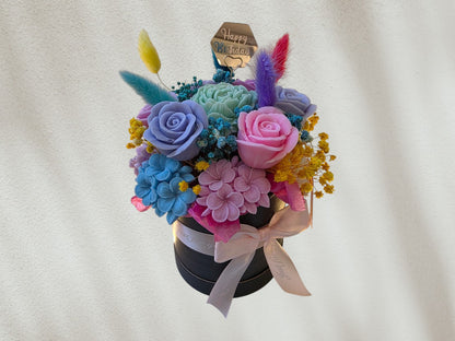 Flower arrangement in a box with ribbon